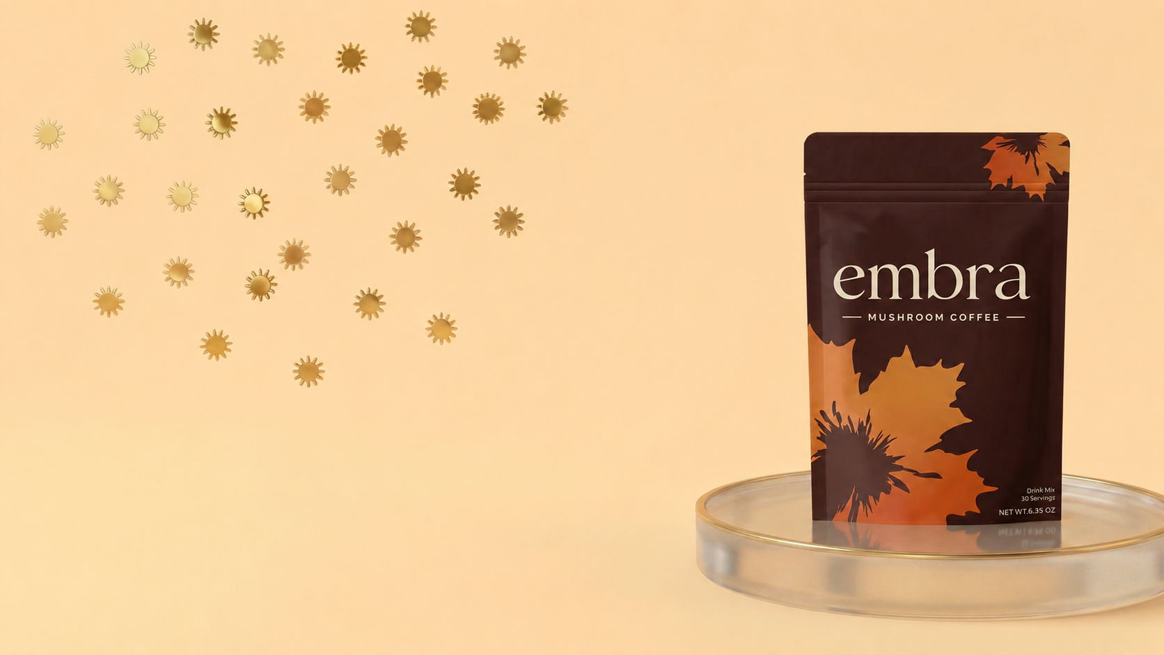 Embra Mushroom Coffee, organic mushroom coffee drink mix on a glass riser with golden sun motifs